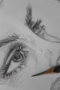 Explore this close-up pencil sketch highlighting intricate details and textures of human eyes, emphasizing artistic expression.